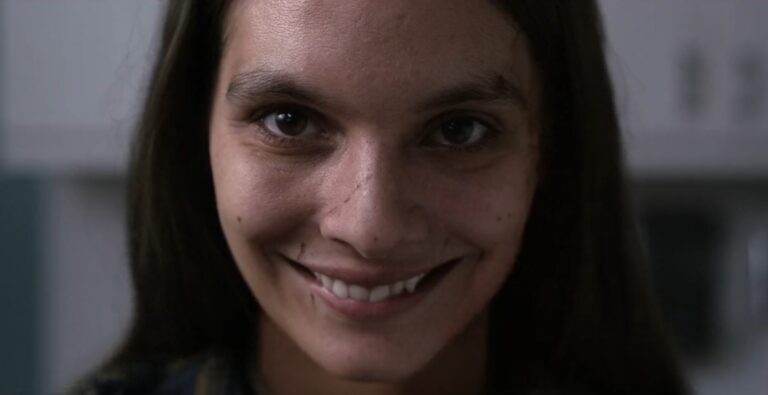 Movie Review: ‘Smile’ Harkens Back to A Meaner Age of Horror